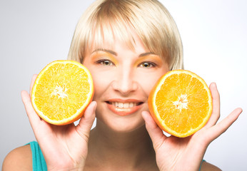 Woman with oranges