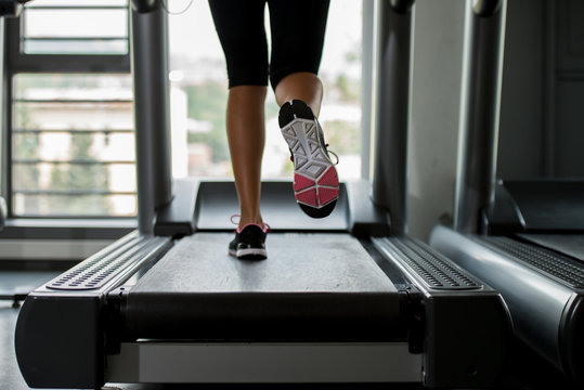 Girl Running On Treadmill