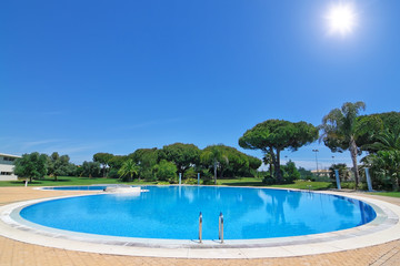 Lovely outdoor pool at the hotel for rest.