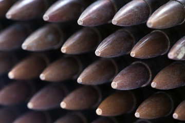 5.56mm rifle cartridges piled up