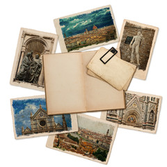 open old book with retro postcards isolated on white