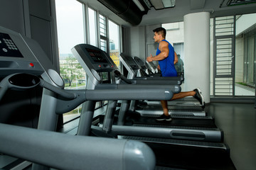 Fototapeta na wymiar Running on treadmill