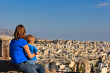 Fototapeta na wymiar family looking at Athens, Greece