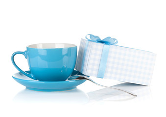 Blue coffee cup and gift box with bow