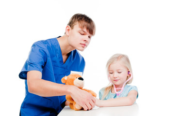 child to the doctor in blue robe