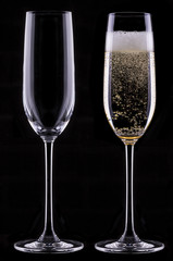 full and empty glass of champagne