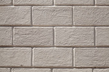Obraz premium Gray stone wall with decorative bricks