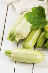 Fresh marrow on wooden table