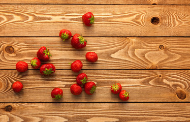 Berries on Wooden Background.