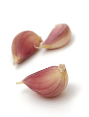 garlic cloves isolated on white