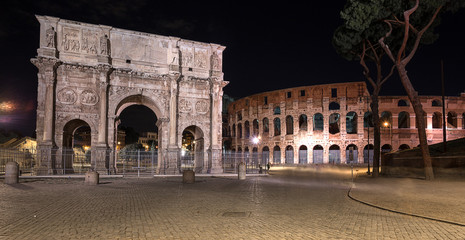 night view of The Colosseum and The Arch of Constantine in Rome
