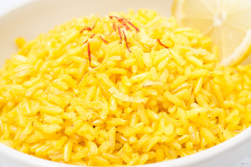 rice with lemon and saffron, close-up, selective focus