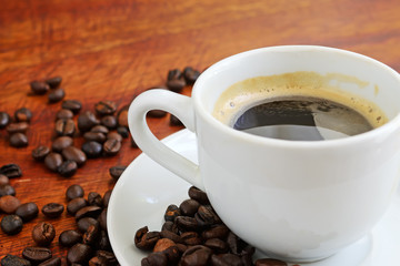 cup of coffee with beans
