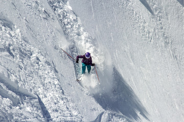 Woman Snow Skier on a dangerous, steep slope © Alex