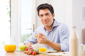 Fototapeta na wymiar Man Having Breakfast