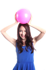 Asian woman playing pink on white background