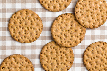 crispbread on checkered tablecloth