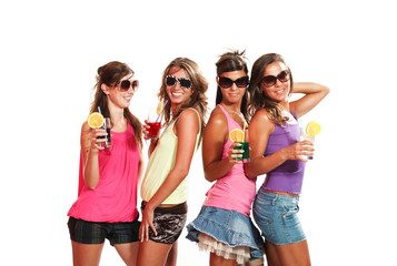 four girls fun with a drink, portrait in studio,