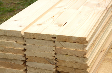 Rows of many planed planks close-up
