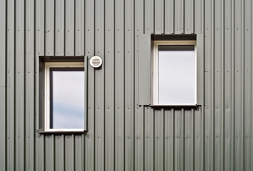 Obraz na płótnie Canvas Detail of two windows of an ecological house