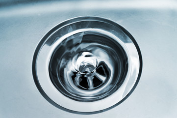 swirl water in a drain