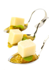 canape with meat seafood and vegetables on a white background