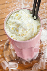 Cold fresh ice coffee with coconut