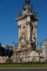 Fototapeta na wymiar Plaza de Espana fountain with National Palace in background, Bar