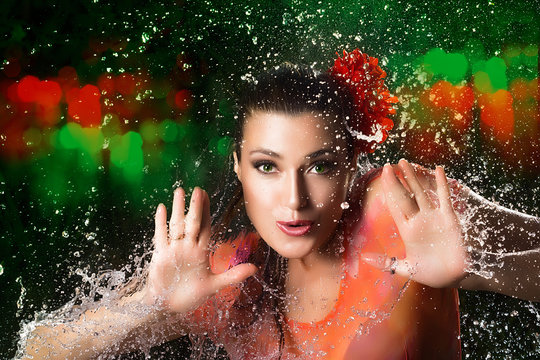 Beauty Brunette woman. Water Splash