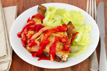 fried chicken with pepper and salad