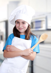 little girl dressed as a cook