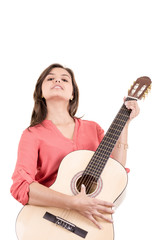 Fototapeta premium beautiful smiling hispanic lady playing acoustic guitar