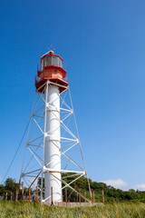 Lighthouse against a blue sky