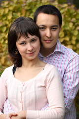 Fototapeta premium Young couple hugging