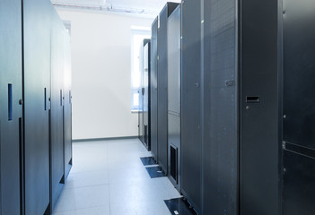network server room with row of server racks