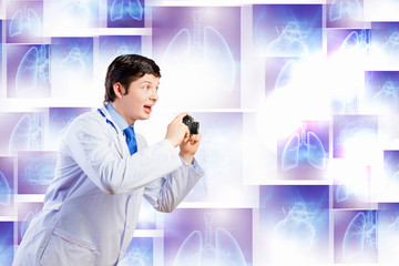 Doctor with photo camera