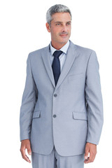 Cheerful businessman looking away