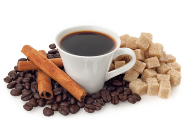 Coffee cup and beans with sugar and cinnamon on white background