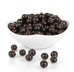 Fresh black currant isolated on white