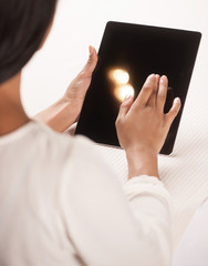 Woman with digital tablet. Top view of beautiful African descent