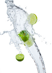 Fresh lime  falling in water splash, isolated on white backgro