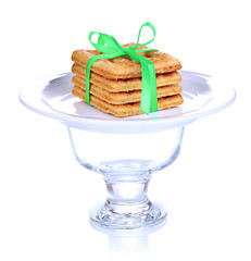 Sweet cookies tied with colorful ribbons isolated on white