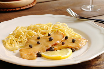 Chicken piccata milanese with pasta