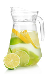 Cold water with lime, lemon and ice in pitcher isolated on