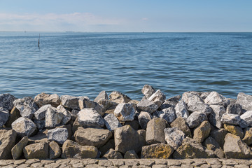 Seawall in the Netherlands made from big basalt rocks