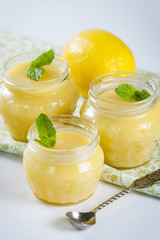Homemade lemon curd with fresh lemons