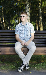Smiling man on the bench