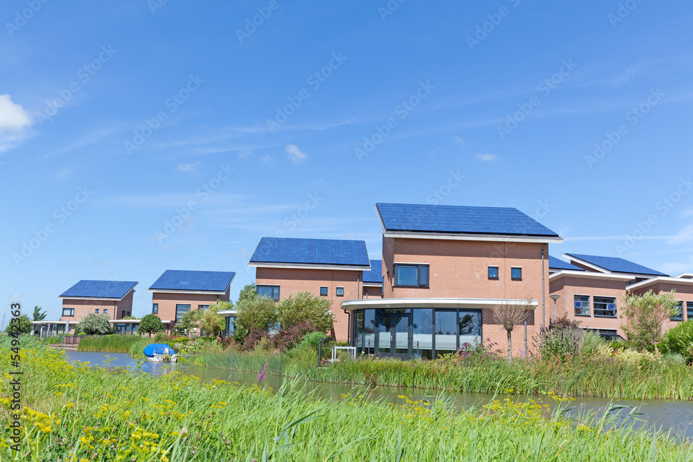 Wall mural New family homes with solar panels