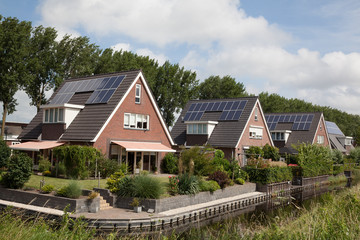 Fototapeta na wymiar New family homes with solar panels