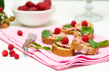 Canape with hand-made perigueux truffle paste ( pate) and raspbe